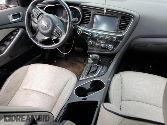 2014 Kia Optima EX z VIN KNAGN4AD1E5076018, wystawiony jako Copart lot #63213845 z przebiegiem 102 395 mil mil oraz Szkoda całkowita • Salvage title. Historia ofert i sprzedaży dostępna na DreamBid. Obrazek 8.