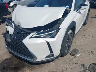 2021 Lexus UX with VIN JTHX9JBH9M2040678, listed as a IAAI auction lot 41727164 with 71,004 mi miles. Bid and sale history available at carsss.com. Image 6.