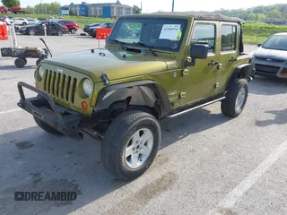 2007 Jeep Wrangler Unlimited Sahara with VIN 1J4GA59177L182593, listed as a IAAI auction lot 42104934 with 158,990 mi miles and . Bid and sale history available at DreamBid. Image 17.