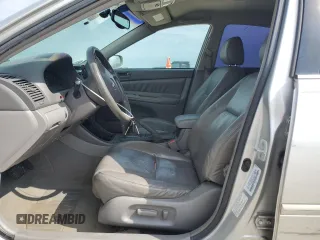 2002 Toyota Camry XLE z VIN 4T1BF32K12U519069, wystawiony jako Copart lot #55501405 z przebiegiem 186 142 mil mil oraz Szkoda całkowita • Salvage title. Historia ofert i sprzedaży dostępna na DreamBid. Obrazek 7.
