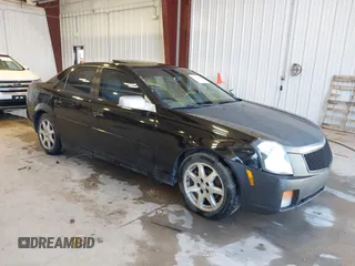 2003 Cadillac CTS with VIN 1G6DM57N630145426, listed as a IAAI auction lot 42141105 with 203,859 mi miles. Bid and sale history available at carsss.com. Image 1.