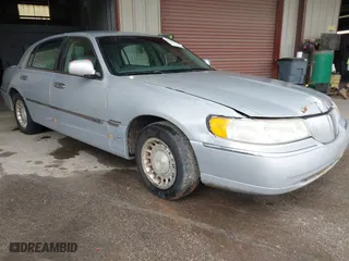 2002 Lincoln Town Car Executive with VIN 1LNHM81W42Y608998, listed as a IAAI auction lot 42096798 with 222,672 mi miles. Bid and sale history available at carsss.com. Image 1.