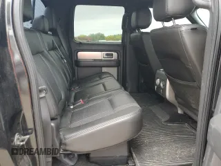 2014 Ford F-150 SVT Raptor with VIN 1FTFW1R60EFA82287, listed as a Copart auction lot 52150635 with 157,556 mi miles and Salvage Title. Bid and sale history available at carsss.com. Image 10.