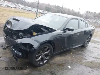 2019 Dodge Charger GT with VIN 2C3CDXHGXKH630462, listed as a IAAI auction lot 41522556 with 122,552 mi miles and . Bid and sale history available at DreamBid. Image 2.