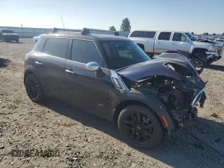 2013 MINI Countryman S ALL4 with VIN WMWZC5C52DWM16196, listed as a Copart auction lot 65157165 with Not provided miles and Salvage title. Bid and sale history available at DreamBid. Image 4.