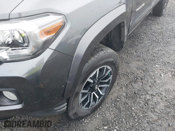 2021 Toyota Tacoma 4WD SR5 with VIN 3TMDZ5BN4MM099423, listed as a IAAI auction lot 41208397 with 62,935 mi miles. Bid and sale history available at carsss.com. Image 12.