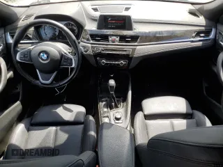 2018 BMW X2 xDrive28i z VIN WBXYJ5C35JEF80889, wystawiony jako Copart lot #57624455 z przebiegiem 80 012 mil mil oraz Szkoda całkowita • Salvage title. Historia ofert i sprzedaży dostępna na DreamBid. Obrazek 8.