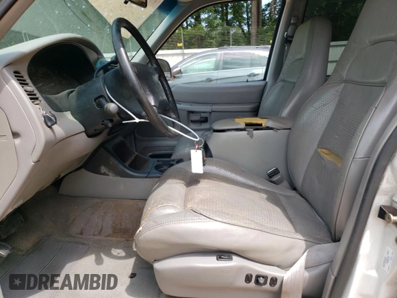 1997 Ford Explorer XL with VIN 1FMDU32E8VUC60285, listed as a Copart auction lot 66154644 with 219,066 mi miles and Salvage title. Bid and sale history available at DreamBid. Image 7.
