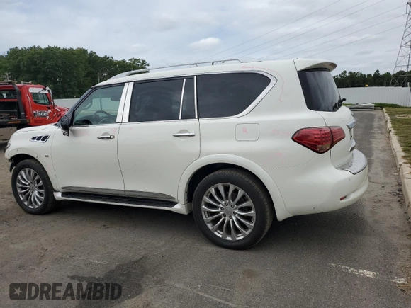 2016 Infiniti QX80 with VIN JN8AZ2NCXG9401865, listed as a Copart auction lot 70574004 with 111,335 mi miles and Salvage Title. Bid and sale history available at DreamBid. Image 2.
