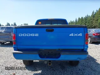 2001 Dodge 1500 z VIN 3B7HF13Z31M533735, wystawiony jako IAAI lot #42417352 z przebiegiem 184 487 mil mil oraz . Historia ofert i sprzedaży dostępna na DreamBid. Obrazek 17.