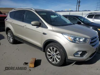 2017 Ford Escape Titanium with VIN 1FMCU9JD8HUE83650, listed as a Copart auction lot 48498245 with 103,920 mi miles and Salvage Title. Bid and sale history available at carsss.com. Image 4.