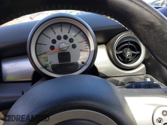 2007 MINI Hardtop S with VIN WMWMF73507TT83203, listed as a IAAI auction lot 41832035 with Not Provided miles and . Bid and sale history available at DreamBid. Image 7.