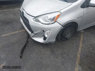 2015 Toyota Prius c One with VIN JTDKDTB39F1101482, listed as a IAAI auction lot 41177534 with 135,502 mi miles. Bid and sale history available at carsss.com. Image 6.