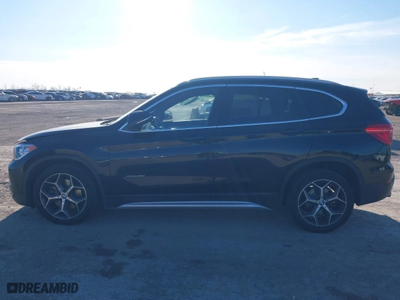 2018 BMW X1 sDrive28i with VIN WBXHU7C37J5H43318, listed as a IAAI auction lot 41294730 with 73,600 mi miles. Bid and sale history available at carsss.com. Image 14.