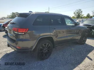 2017 Jeep Grand Cherokee 75th Anniversary with VIN 1C4RJEAG4HC700191, listed as a Copart auction lot 52520655 with 130,828 mi miles and Salvage title. Bid and sale history available at DreamBid. Image 3.