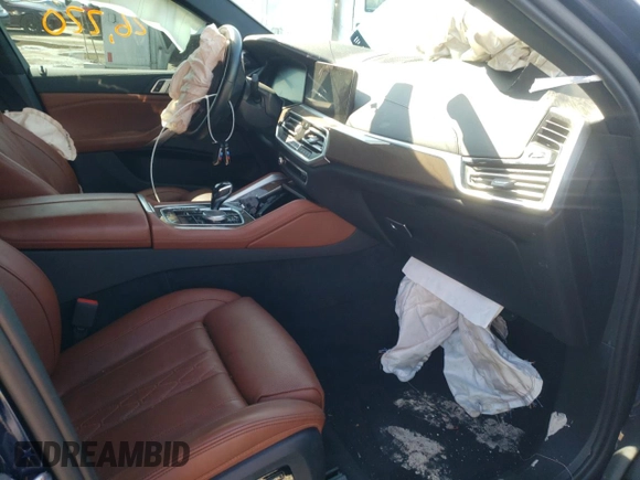 2021 BMW X6 M50i with VIN 5UXCY8C09M9E66884, listed as a Copart auction lot 63025622 with 26,220 mi miles and Salvage Title. Bid and sale history available at carsss.com. Image 5.