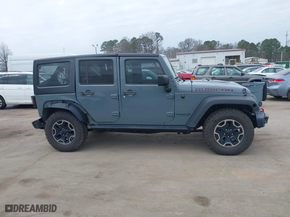 2015 Jeep Wrangler Unlimited Rubicon Hard Rock with VIN 1C4HJWFG1FL679873, listed as a IAAI auction lot 41508722 with 97,165 mi miles. Bid and sale history available at carsss.com. Image 13.