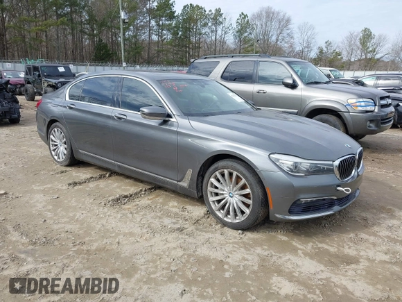 2017 BMW 7 Series 740i with VIN WBA7E2C54HG740170, listed as a IAAI auction lot 41432578 with 110,893 mi miles and . Bid and sale history available at DreamBid. Image 1.