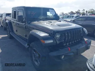 2021 Jeep Gladiator Rubicon z VIN 1C6JJTBG5ML544969, wystawiony jako IAAI lot #41902421 z przebiegiem 31 723 mil mil oraz . Historia ofert i sprzedaży dostępna na DreamBid. Obrazek 1.