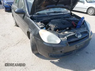 2009 Hyundai Accent Auto GLS z VIN KMHCN46C39U334712, wystawiony jako IAAI lot #42334874 z przebiegiem 193 090 mil mil oraz . Historia ofert i sprzedaży dostępna na DreamBid. Obrazek 12.