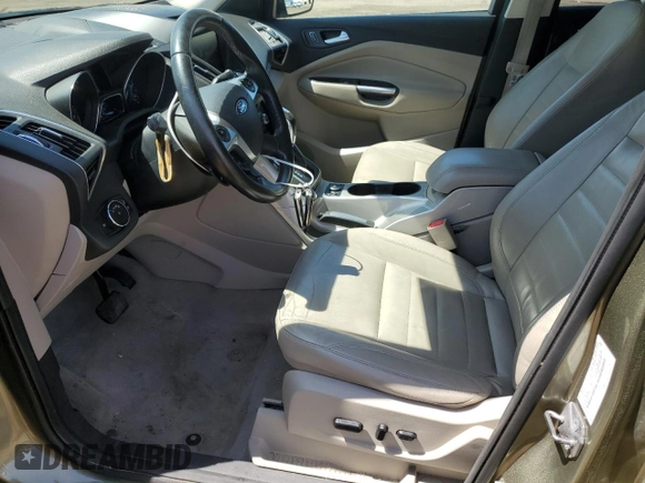 2013 Ford Escape SEL z VIN 1FMCU9H93DUD67848, wystawiony jako Copart lot #57221755 z przebiegiem 129 671 mil mil oraz Czysty tytuł • Clean title. Historia ofert i sprzedaży dostępna na DreamBid. Obrazek 7.