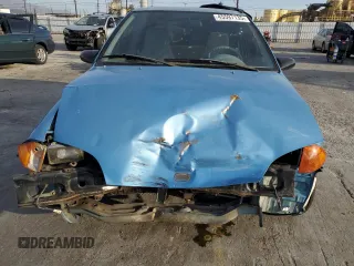 1994 Geo Metro z VIN 2C1MR2467R6780100, wystawiony jako Copart lot #45597135 z przebiegiem 100 000 mil mil oraz Szkody całkowita. Historia ofert i sprzedaży dostępna na DreamBid. Obrazek 5.