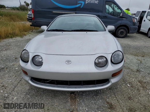 1995 Toyota Celica ST z VIN JT2AT00F8S0037180, wystawiony jako Copart lot #74536414 z przebiegiem Nie podano mil oraz Szkoda całkowita • Salvage title. Historia ofert i sprzedaży dostępna na DreamBid. Obrazek 5.