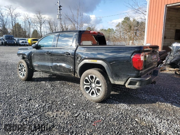 2024 GMC Canyon 4WD AT4 with VIN 1GTP6DEK2R1180037, listed as a Copart auction lot 85656994 with 7,565 mi miles and Salvage Title. Bid and sale history available at carsss.com. Image 2.