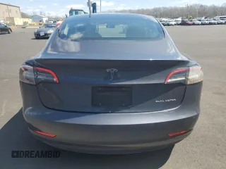 2022 Tesla Model 3 Long Range with VIN 5YJ3E1EBXNF188596, listed as a Copart auction lot 51846915 with 49,271 mi miles and Non Repairable. Bid and sale history available at carsss.com. Image 6.