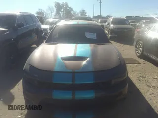 2023 Dodge Charger R/T with VIN 2C3CDXCT7PH576212, listed as a IAAI auction lot 41285793 with 37,471 mi miles and . Bid and sale history available at DreamBid. Image 12.