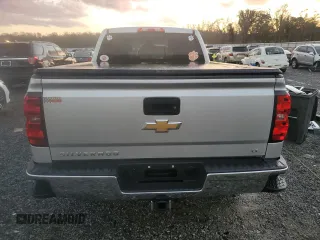 2015 Chevrolet Silverado 1500 LT with VIN 1GCRCREC1FZ431764, listed as a Copart auction lot 80342874 with 143,658 mi miles and Salvage Title. Bid and sale history available at DreamBid. Image 6.