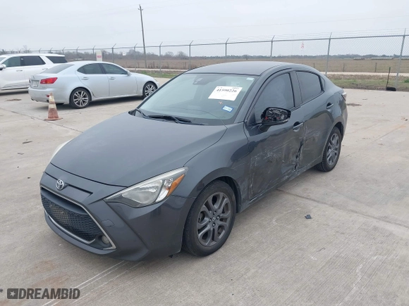 2019 Toyota Yaris Sedan L with VIN 3MYDLBYV2KY520151, listed as a IAAI auction lot 41590226 with 115,880 mi miles. Bid and sale history available at carsss.com. Image 17.