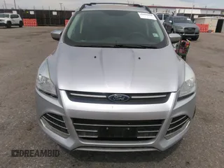 2016 Ford Escape SE with VIN 1FMCU9G91GUA29242, listed as a IAAI auction lot 42099898 with 125,330 mi miles. Bid and sale history available at carsss.com. Image 12.