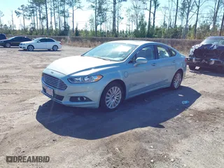 2013 Ford Fusion Energi SE Luxury with VIN 3FA6P0PU2DR282331, listed as a IAAI auction lot 41635104 with 61,231 mi miles. Bid and sale history available at carsss.com. Image 17.