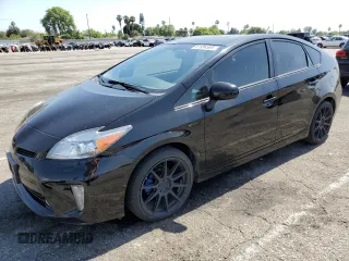 2015 Toyota Prius Four with VIN JTDKN3DU0F1923445, listed as a Copart auction lot 61954585 with 104,481 mi miles and Salvage title. Bid and sale history available at DreamBid. Image 1.
