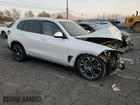 2024 BMW X5 xDrive50e with VIN 5UX43EU07R9S99719, listed as a Copart auction lot 86121144 with 0 mi miles and Salvage Title. Bid and sale history available at carsss.com. Image 4.