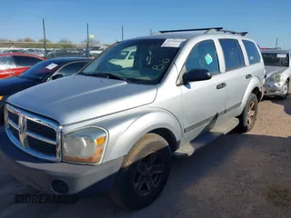 2006 Dodge Durango SXT с VIN 1D4HB38N86F166015, выставлен на аукционе IAAI как лот 41799450 с пробегом 243 754 миль миль и . История ставок и продаж доступна на DreamBid. Изображение 2.