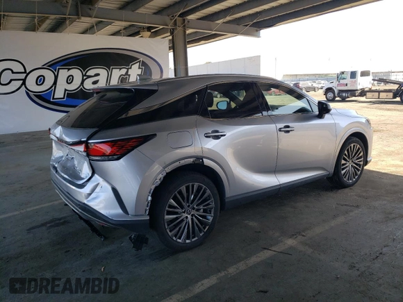 2024 Lexus RX 450h+ Luxury with VIN JTJCJMGA5R2012434, listed as a Copart auction lot 58835645 with 10,905 mi miles and Salvage title. Bid and sale history available at DreamBid. Image 3.