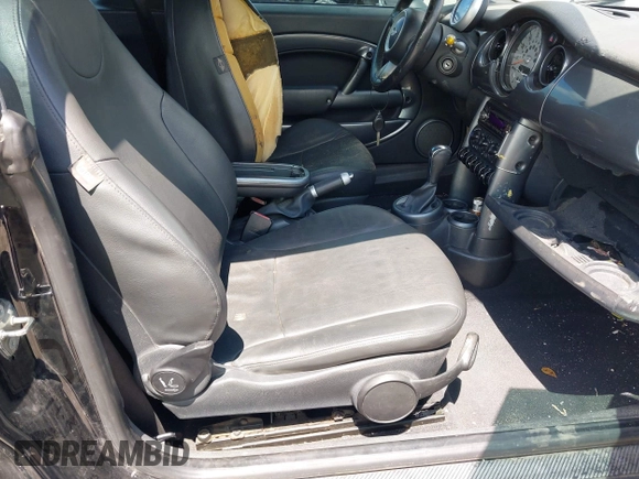 2006 MINI Convertible with VIN WMWRF33566TG15464, listed as a IAAI auction lot 42285777 with 144,430 mi miles and . Bid and sale history available at DreamBid. Image 5.