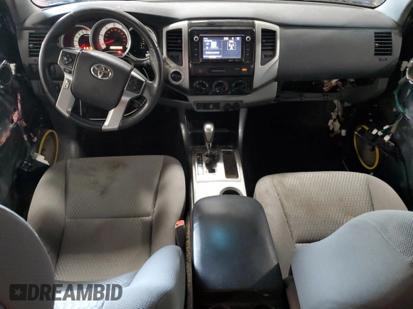 2015 Toyota Tacoma with VIN 3TMLU4EN6FM186016, listed as a Copart auction lot 58404675 with 127,536 mi miles and Salvage title. Bid and sale history available at DreamBid. Image 8.