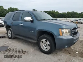 2010 Chevrolet Tahoe LS with VIN 1GNUCAE00AR103589, listed as a Copart auction lot 60621345 with 214,922 mi miles and Salvage title. Bid and sale history available at DreamBid. Image 4.