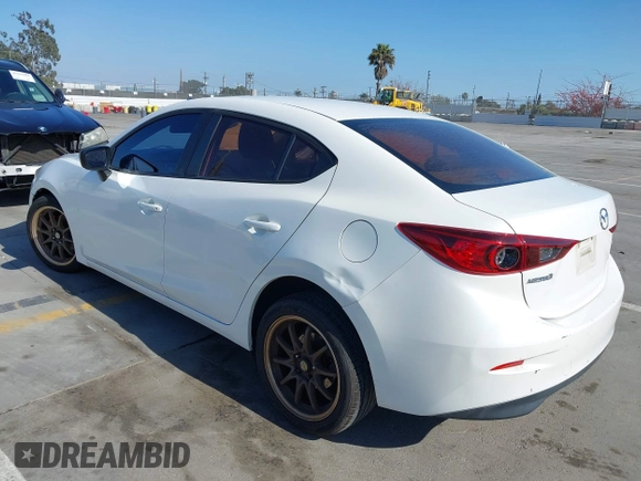 2015 Mazda 3 i SV with VIN JM1BM1T71F1218642, listed as a IAAI auction lot 42142795 with 134,143 mi miles. Bid and sale history available at carsss.com. Image 3.