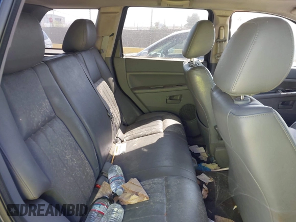 2005 Jeep Grand Cherokee Laredo with VIN 1J4GR48K35C518587, listed as a IAAI auction lot 42741449 with 164,821 mi miles and . Bid and sale history available at DreamBid. Image 8.