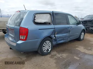 2011 Kia Sedona LX with VIN KNDMG4C70B6424016, listed as a IAAI auction lot 41964190 with 116,859 mi miles. Bid and sale history available at carsss.com. Image 4.