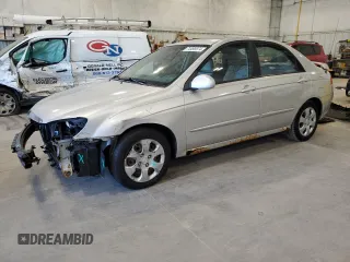 2009 Kia Spectra EX with VIN KNAFE221X95650545, listed as a Copart auction lot 74496974 with 203,752 mi miles and Non Repairable. Bid and sale history available at carsss.com. Image 1.