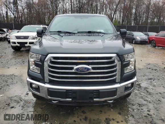 2015 Ford F-150 XLT with VIN 1FTEW1EF9FKD13777, listed as a Copart auction lot 47982534 with 165,364 mi miles and Salvage title. Bid and sale history available at DreamBid. Image 5.