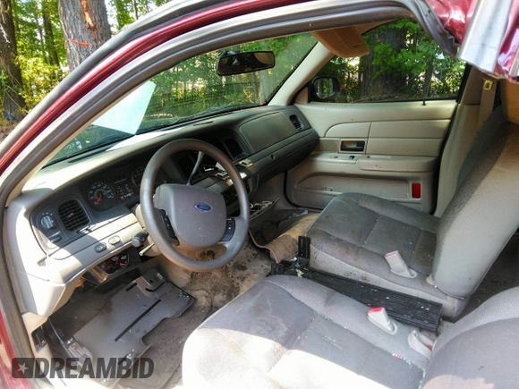 2009 Ford Police Interceptor z VIN 2FAHP71VX9X143897, wystawiony jako IAAI lot #41443264 z przebiegiem Nie podano mil oraz . Historia ofert i sprzedaży dostępna na DreamBid. Obrazek 5.