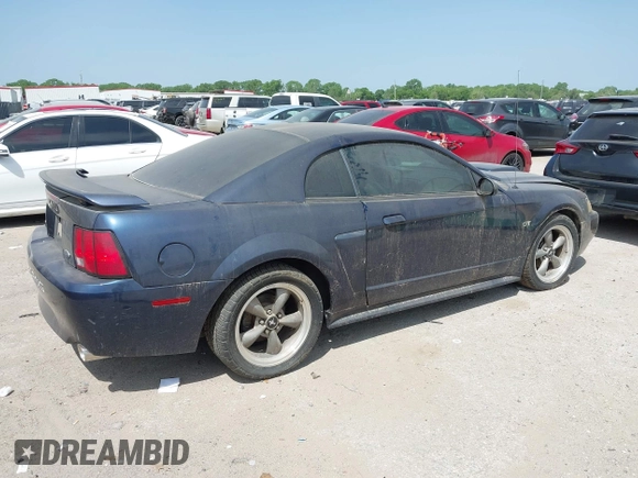 2003 Ford Mustang GT Deluxe with VIN 1FAFP42X63F304318, listed as a IAAI auction lot 42029942 with 83,615 mi miles. Bid and sale history available at carsss.com. Image 4.