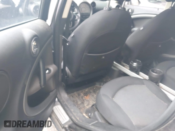 2012 MINI Countryman with VIN WMWZB3C5XCWM30191, listed as a IAAI auction lot 42435291 with 103,254 mi miles and . Bid and sale history available at DreamBid. Image 8.