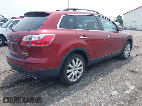2010 Mazda CX-9 Touring with VIN JM3TB3MV7A0234577, listed as a IAAI auction lot 42281237 with 190,547 mi miles and . Bid and sale history available at DreamBid. Image 4.